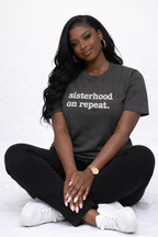 Sisterhood On Repeat Unisex T-Shirt - White Writing