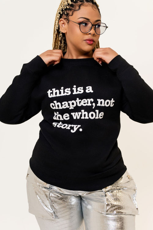 This Is A Chapter, Not The Whole Story Unisex Premium Sweatshirt - Black Writing