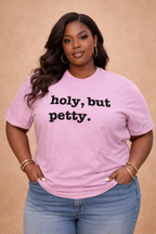 purple t-shirt with holy but petty writing